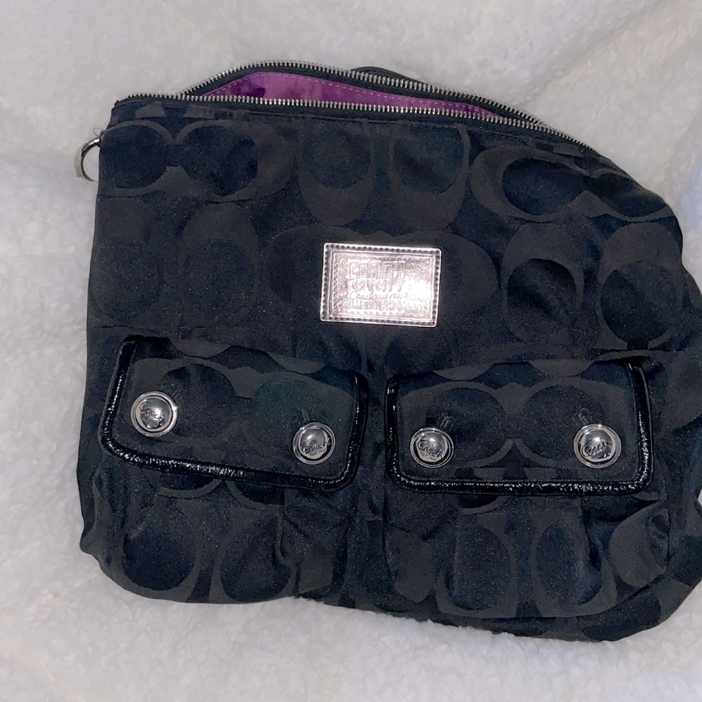Black coat copy bag with purple interior and silver hardware